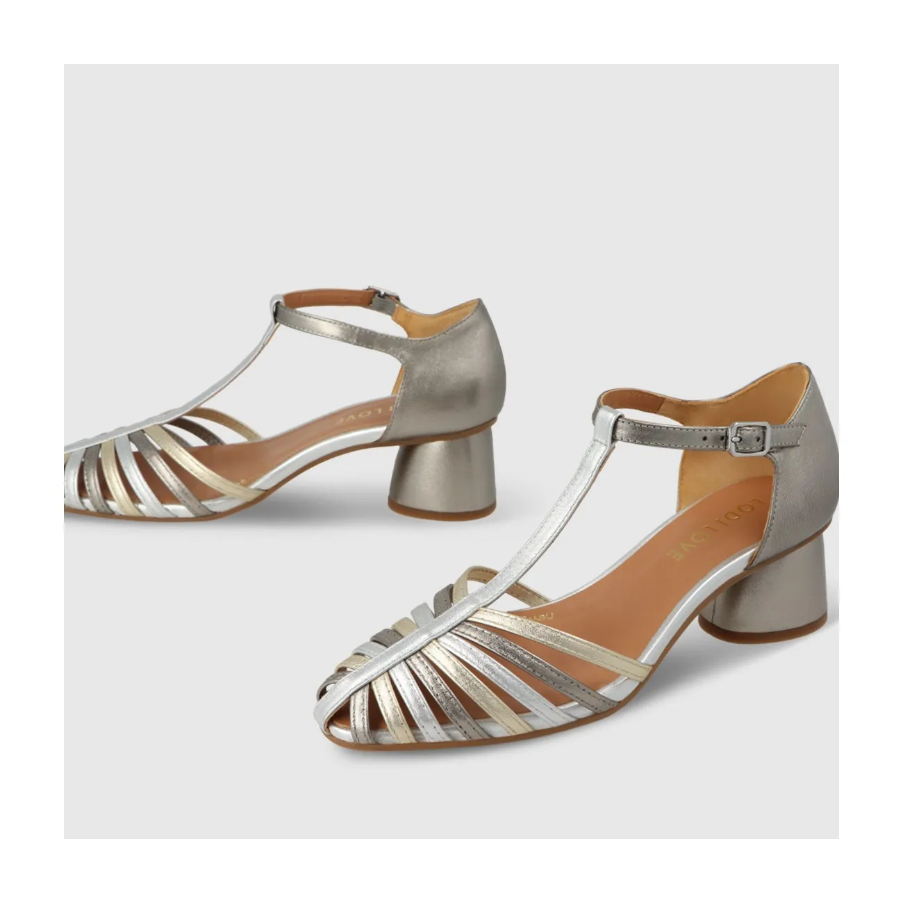 Sandale pour femme en cuir métallisé argenté et tons métalliques. I LODI Chaussures pour femme online.