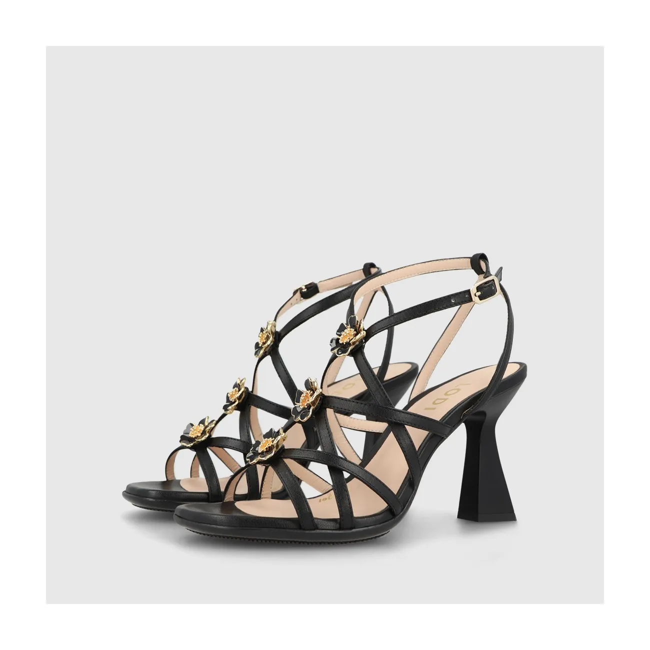 Sandale pour femme en cuir noir avec brides et ornement floral. I LODI Chaussures pour femme online.