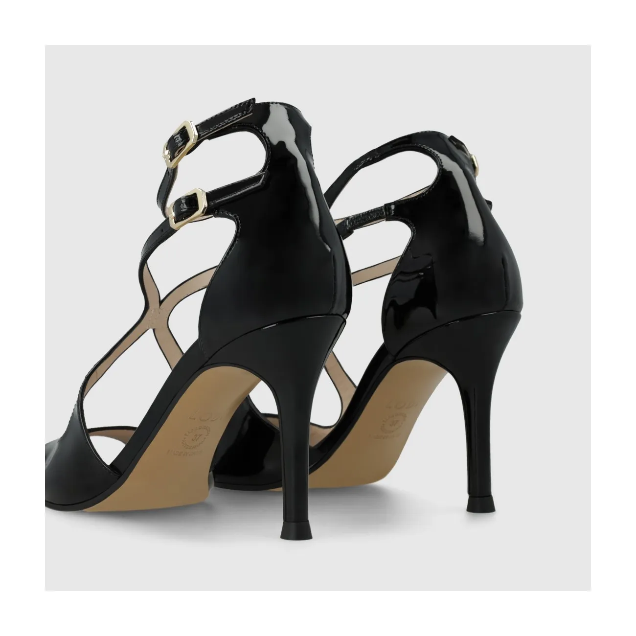 Sandale pour femme en cuir verni noir avec double bride à la cheville et brides entrelacées sur l´empeigne. I LODI Chaussures po